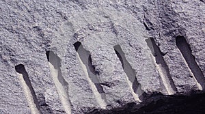 Crocked rock texture with The explosive identification.