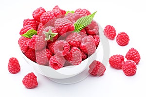 Crockery with beautiful tempting raspberries.