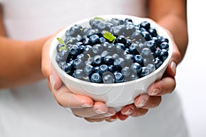 Crockery with blueberries.