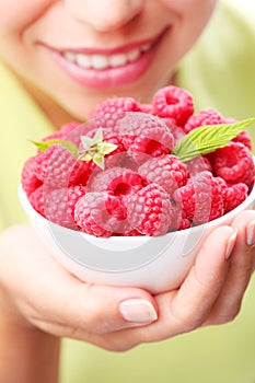 Crockery with raspberries photo