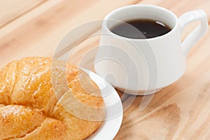 Croissant And Black Coffee Hot Morning Beverage Or Break Time.