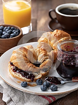 Croissant With Blueberry Jam and Blueberries photo