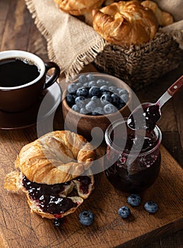 Croissant With Blueberry Jam and Blueberries