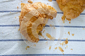 Croissant ,Bread crump on tablecloth