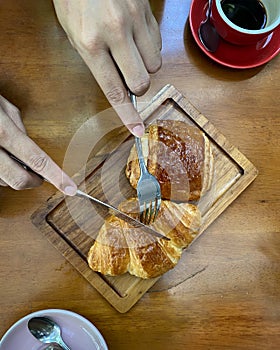 Croissant Breads on wooden tray