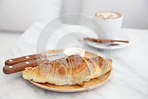 Croissant with coffee