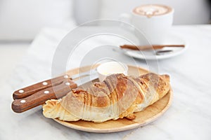 Croissant with coffee