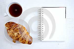 Croissant cup coffee white book