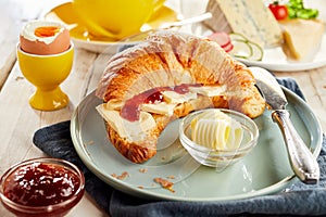 Croissant filled with cheese and ketchup