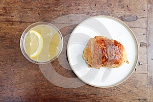 Croissant , French croissant or French bread or bread and lenon juice photo