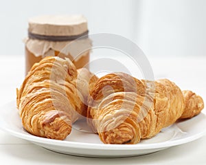 Croissant and honey