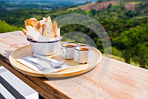 Croissant with Milked Tea on the Hill photo