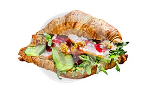 Croissant sandwich with cheese, arugula and ham. Isolated on white background.