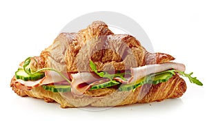 Croissant sandwich with ham and cucumber