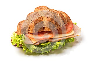 Croissant sandwich with hum and tomato isolated