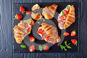 Croissant sandwiches with fresh ripe strawberries