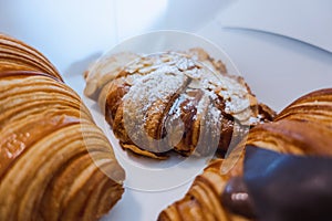 Croissant set in a paper box looks appetizing