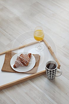 Croissant White Chocolate Breakfast Morning on white background. Cup of Tea or coffee. Rustic Style. Orange Juice. copy space.