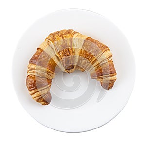 Croissant on white plate