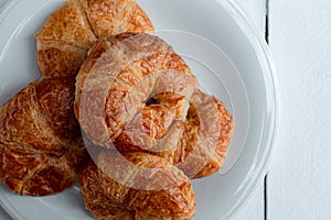 Croissant on wooden tabel background photo