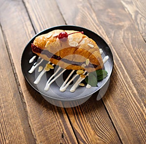 Croissant on the wooden table