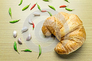 Croissant on woonden table