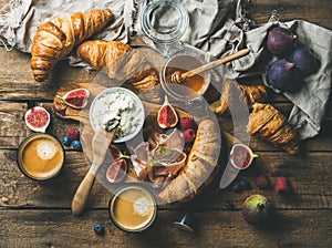 Croissants, ricotta cheese, figs, fresh berries, prosciutto, honey and espresso