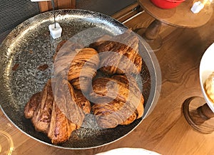 Croissants for Sale on Silver Tray at Showcase of Cafe / Coffee Shop