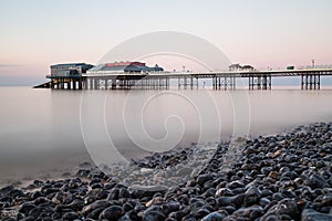 Cromer pier seen over the pebble beach