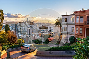 The crookedest street in the world Lombard Street. San Francisco is lightened by morning sun.