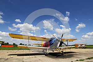 Crop duster airplane on airfield