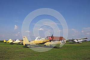 Crop duster airplanes on airfield