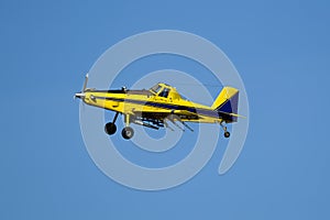 Crop duster in the sky.