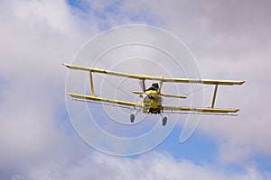 Crop duster spraying fields