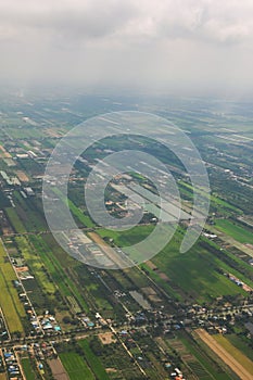 Crop fields and agricultural plantations on a rural area. Aerial view.