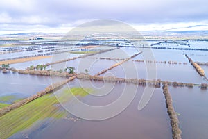 crop fields flooded by spring rains in the region of A Limia, Galicia. Spain. Climate change concept