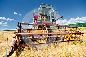 Crop harvesting at the field with professional harverster