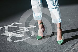 Crop woman in trendy shoes