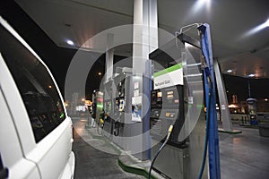 Cropped Car With View Of Fuel Pumps And Natural Gas