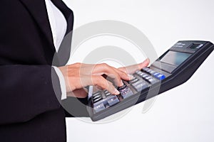 Cropped hand business woman with black suit holding caculator