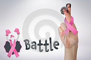 Composite image of cropped hand of woman holding pink breast cancer awareness ribbon