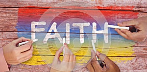 Composite image of cropped hands of people holding chalks