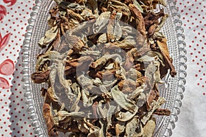 Cropped horizontal shoot of traditionally dried under sun string beans on transparent with table sheet