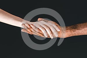 cropped image of african american boyfriend and girlfriend holding hands