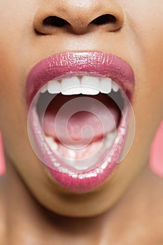 Cropped image of African American woman with mouth open