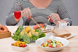 Cropped image of asian woman have breakfast
