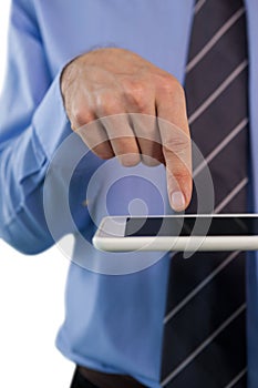 Cropped image of businessman using tablet computer
