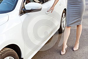 cropped image of businesswoman opening