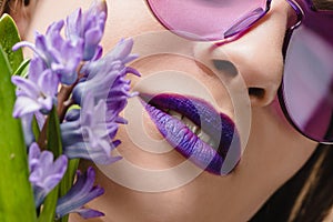 cropped image of girl with purple lips