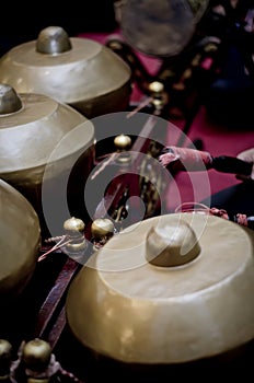 Cropped image high school boy performing traditional malay music